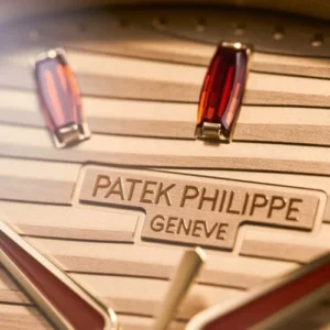 Patek Philippe Nautilus 7118/1300R-001 Automatic Rose Gold Baguette Cognac Bezel
