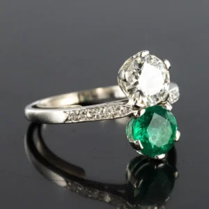 1930s French Platinum Art Deco Emerald Diamond “You and Me” Ring