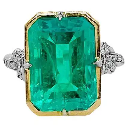 3ct-Emerald-in-Forget-Me-Knot-Ring-Platinum-and-22ct-Yellow-Gold-1.webp